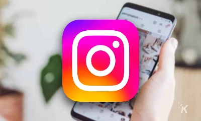 instagram logo with blurred phone background