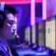 A person is using headphones gaming