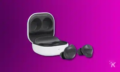samsung galaxy buds fe and charging case on a purple background