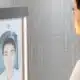 man looking at a smart mirror that is checking his health