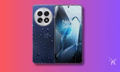 Smartphone with water droplets and gradient background