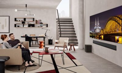 Couple watching TV in modern living room