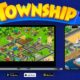 Township game on laptop and smartphone screens.