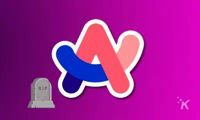 Colorful abstract logo with a tombstone.